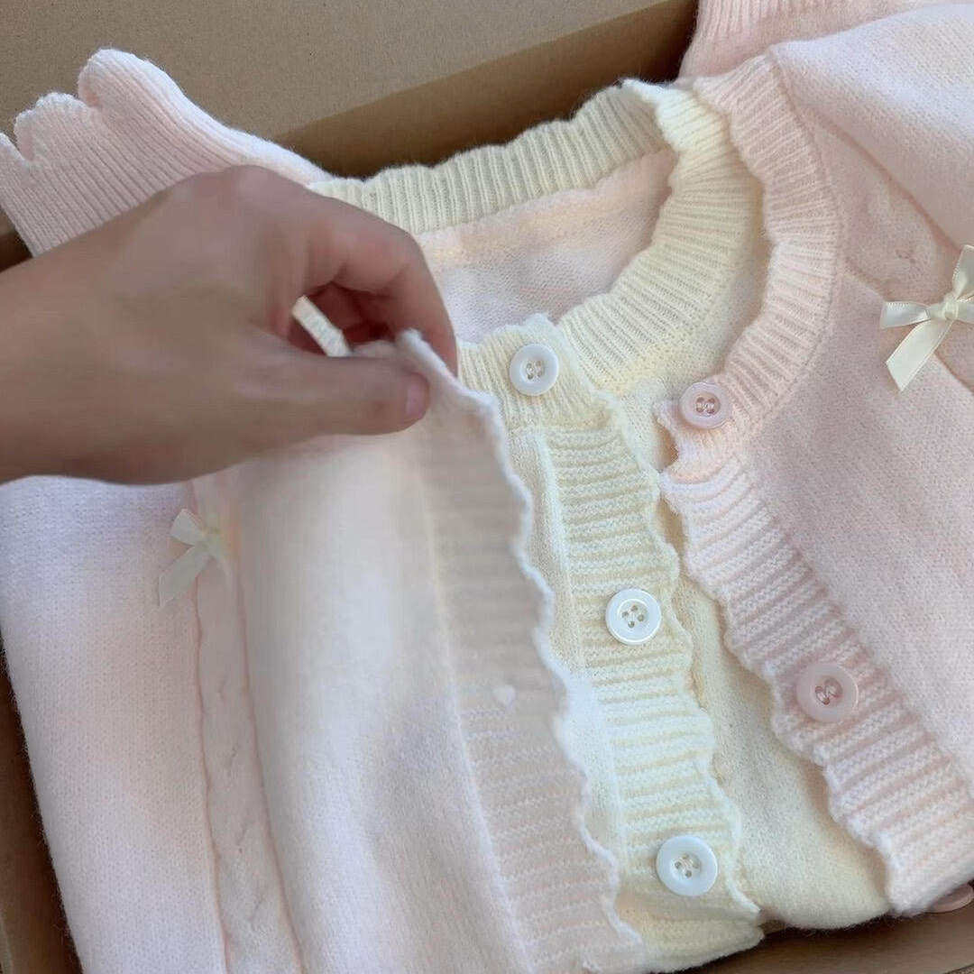 韩系假两件粉色上衣女春秋巨好看慵懒风蝴蝶结针织衫开衫毛衣外套