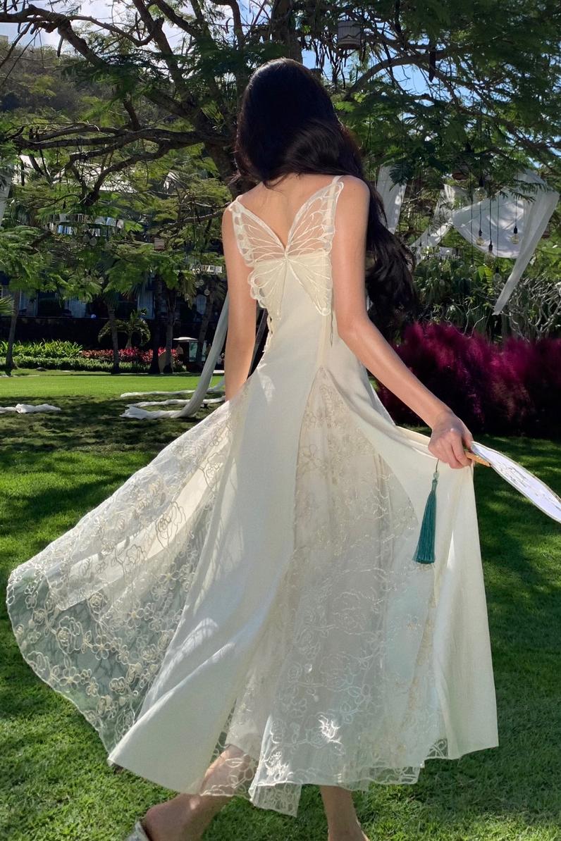 海边度假连衣裙美背蝴蝶结设计感超仙蕾丝吊带裙拍照小众仙女长裙