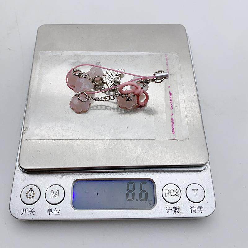 新款铃兰花串镂空领结钥匙扣挂件创意蝴蝶金属配件耳机套包包挂饰