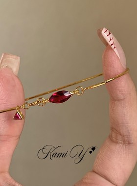 中古金色蛇骨链红锆石马眼钻手链