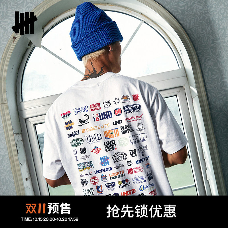 UNDEFEATED五条杠官方夏季新品时尚潮流满版图案印花圆筒短袖T恤