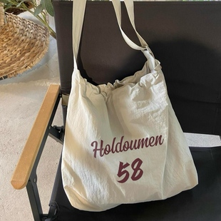 十个勤天周边包holdoumen58包包2025新款十个勤天斜挎单肩帆布包