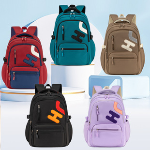 新款儿童书包小学生初中生大容量背包男女孩减负耐脏大口袋双肩包