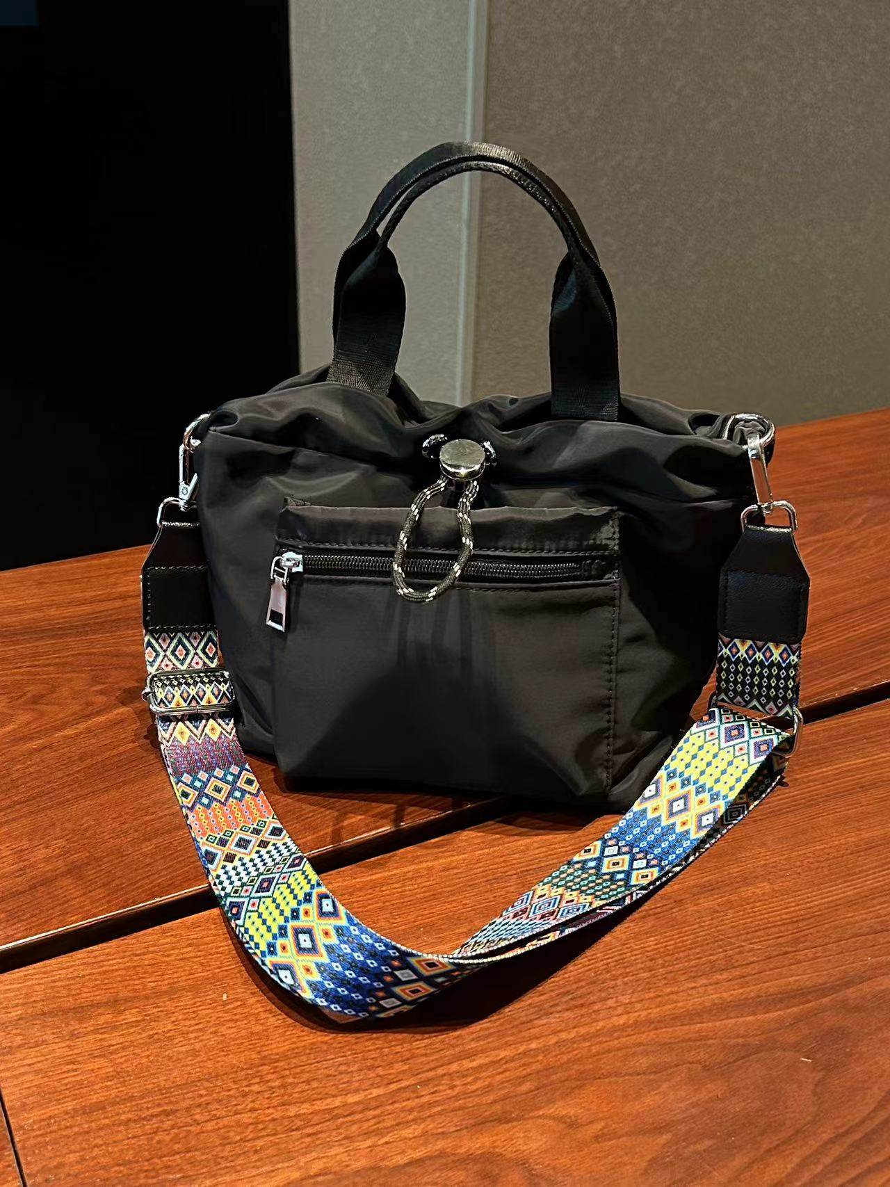 贵宝的包个性潮流小方包尼龙防水面料抽绳水桶包手提包百搭休闲,箱包皮具/热销女包/男包,通用款女包,淘宝优惠券,粉丝福利购,淘宝优惠卷