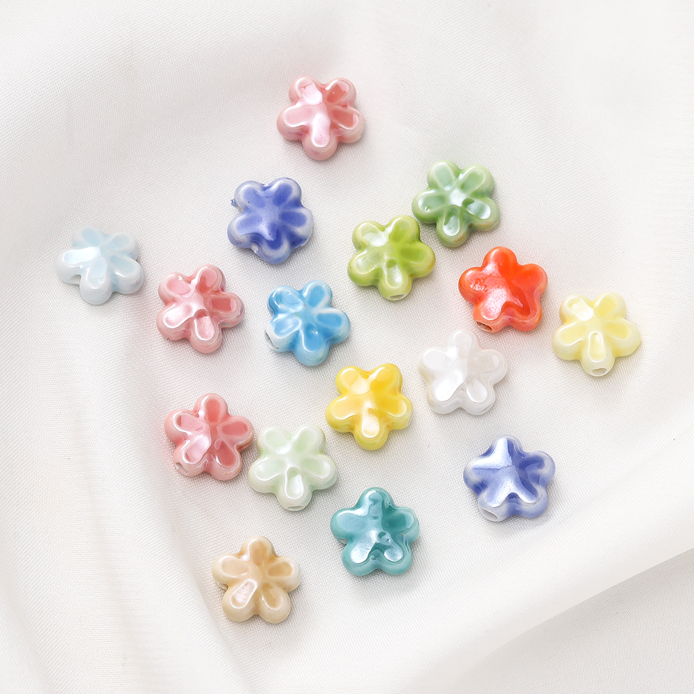 亮彩陶瓷奶油五瓣花通孔珠子