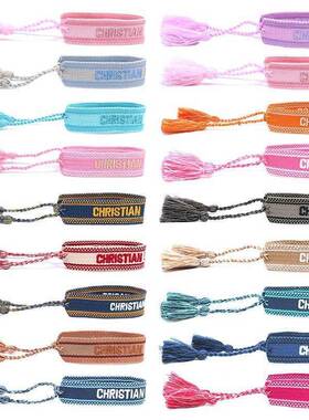 潮流情侣编织带字刺绣苏手