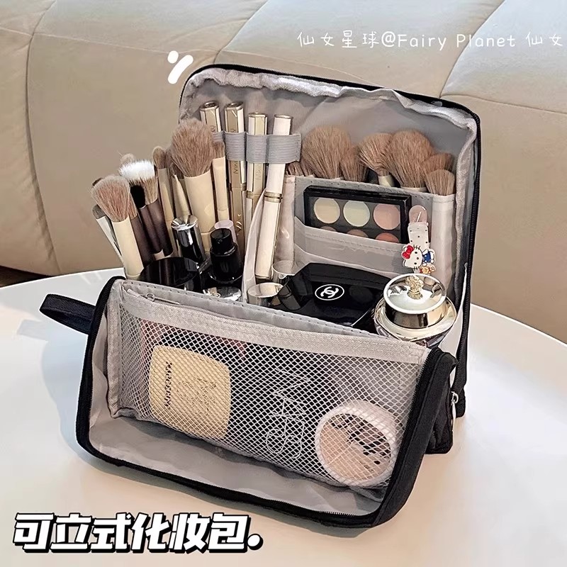 化妆包大容量女便携式2025新款高端分区收纳旅行手提洗漱整理包化妆刷化妆品收纳包便携外出立式可折叠耐脏