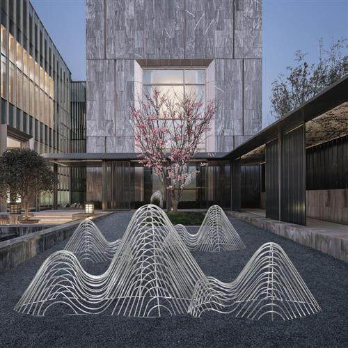 定做不锈钢假山雕塑圆管切片镂空山形鹅卵石水景造型户外创意摆件