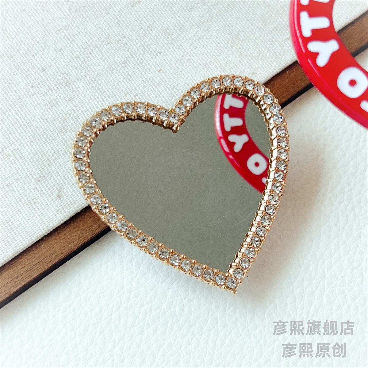 不变形镜面爱心手机磁吸气囊支架图片