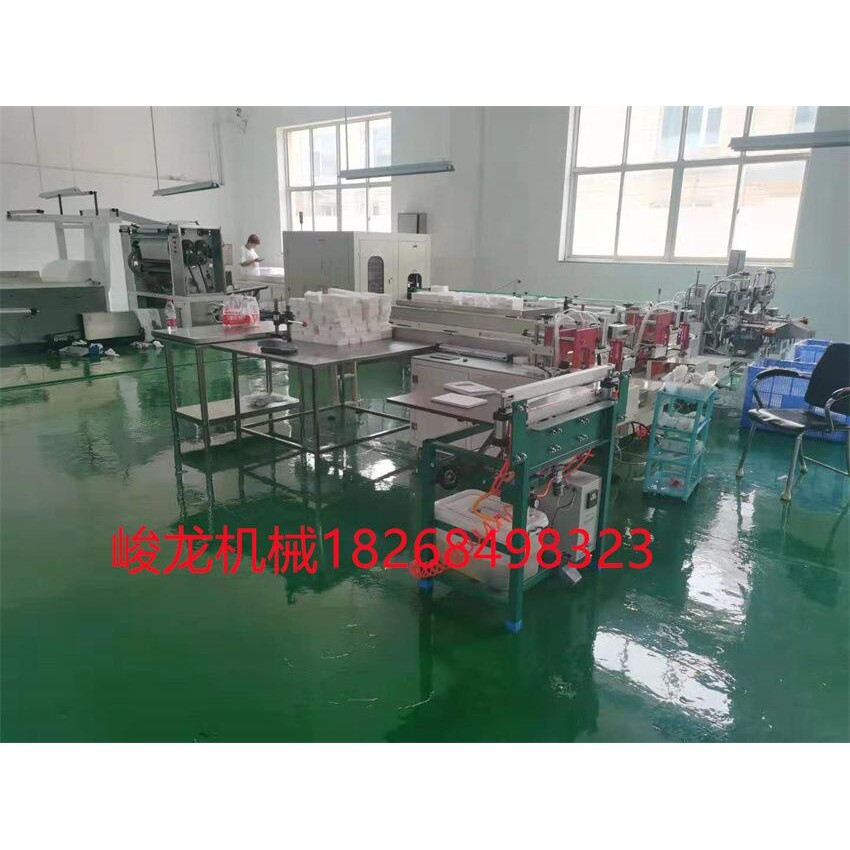 全自动高速棉柔巾折叠机 干巾手拉手互扣无纺布折叠机机械设备
