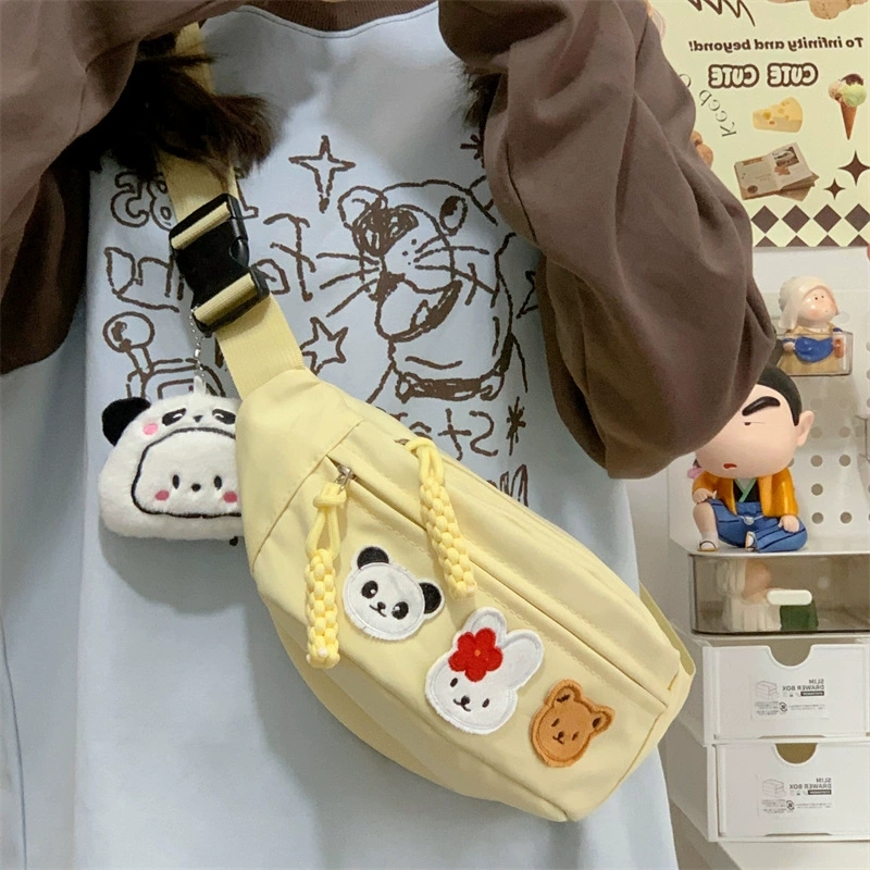 女生斜挎包包女孩旅行小背包外出休闲腰包可爱卡通中大童胸包女童