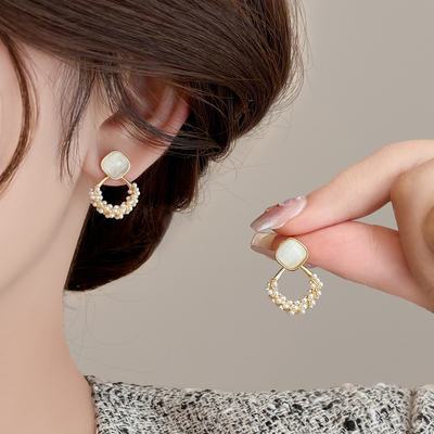 特别的猫眼石珍珠耳环耳钉饰品轻奢高级感大气圆脸适合的耳饰女