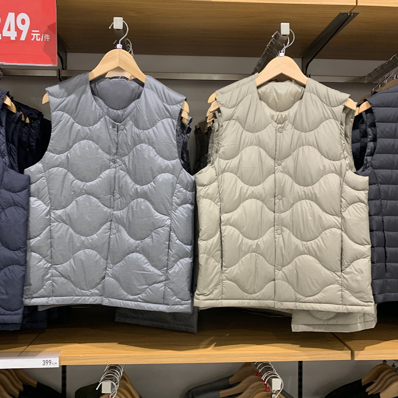 弧形压线羽绒服背心马甲