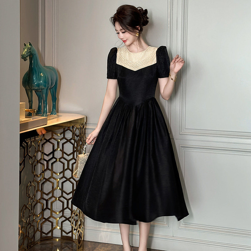 黑色连衣裙女夏季2026新款高级感赫本风长裙收腰显瘦a字裙晚礼服