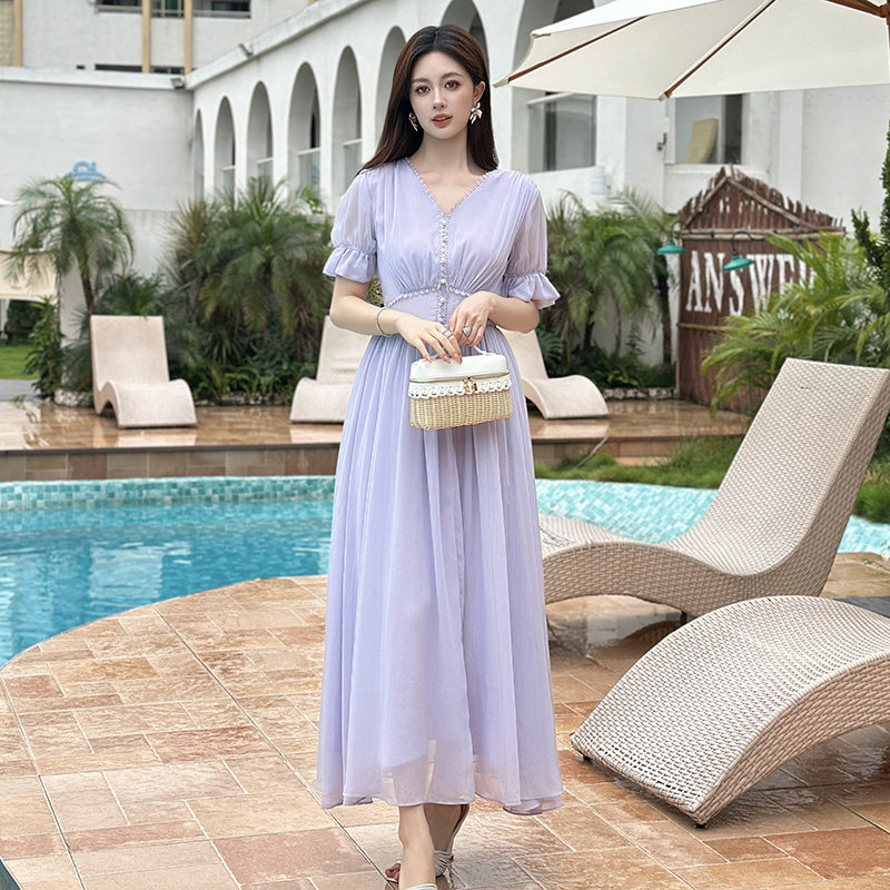紫色连衣裙女2026夏季新款海边度假轻奢气质V领收腰显瘦大摆长裙