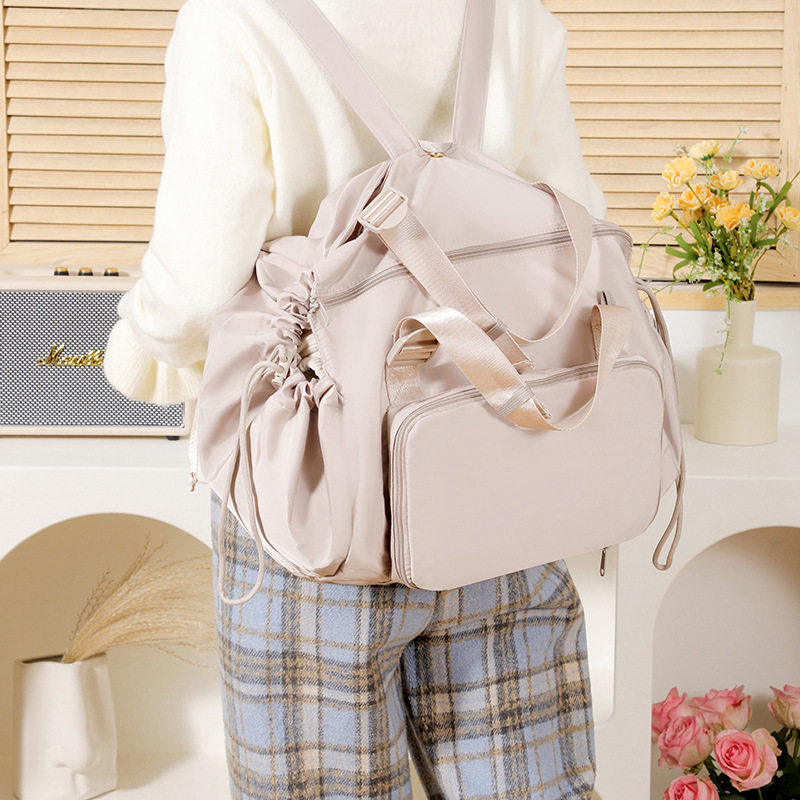 爆款百变摇篮包旅行收纳包女士双肩包多功能妈咪包斜挎单肩遛娃包