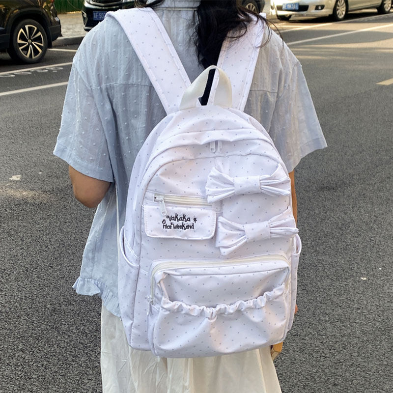 韩系ins风可爱蝴蝶结双肩包女初高中生高颜值书包大容量轻便背包