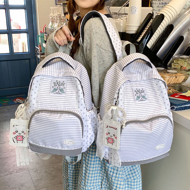 韩系ins风条纹星星双肩包女学生大容量旅游轻便书包小众休闲背包