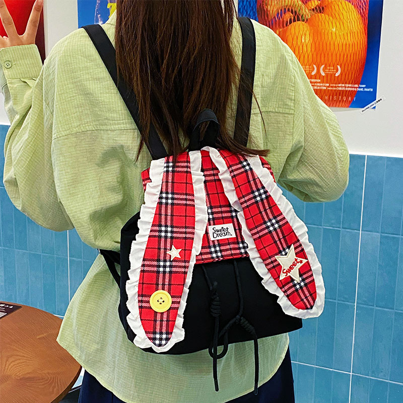 可爱星格子兔耳少女双肩学生书包