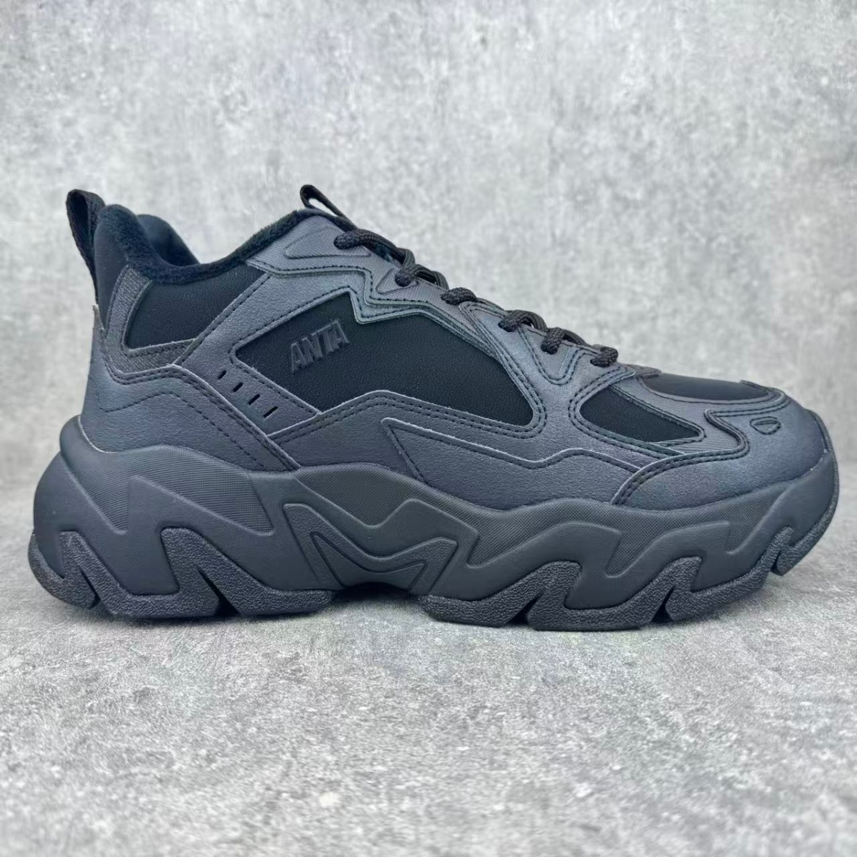 安踏磐石厚底舒适休闲鞋男2025冬款加厚大棉革面2鞋子112548952