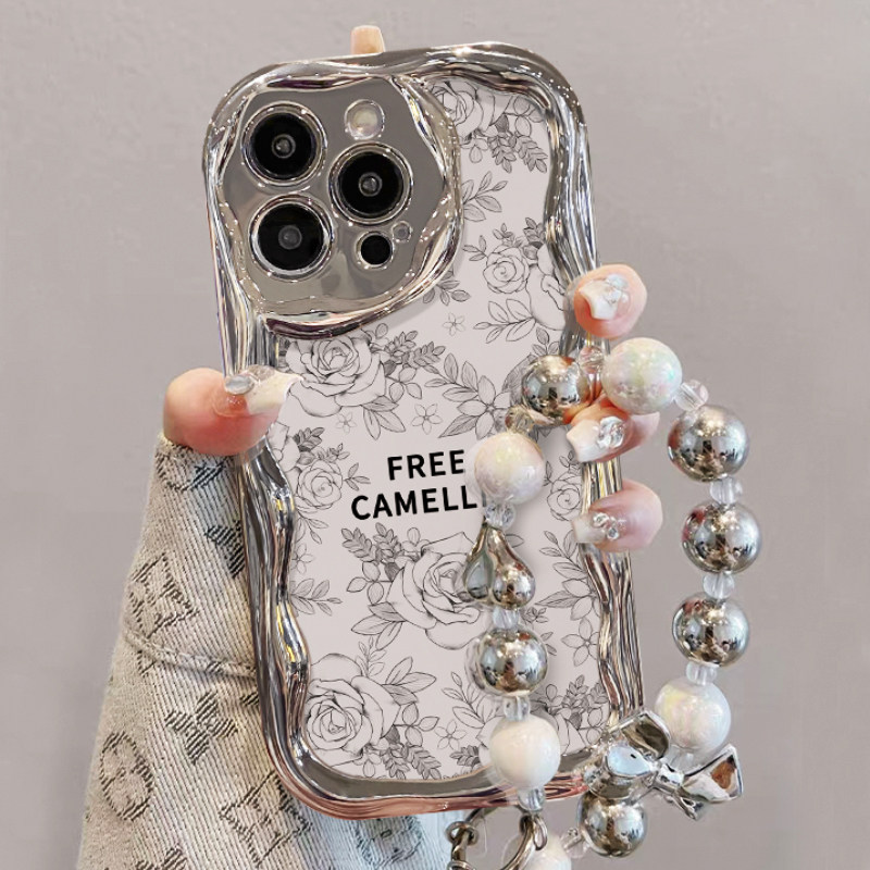 山茶花适用苹果15promax手机壳小众高级感14pro新款电镀硅胶iphone13奢华女款plus全包镜头12带手链11少女套