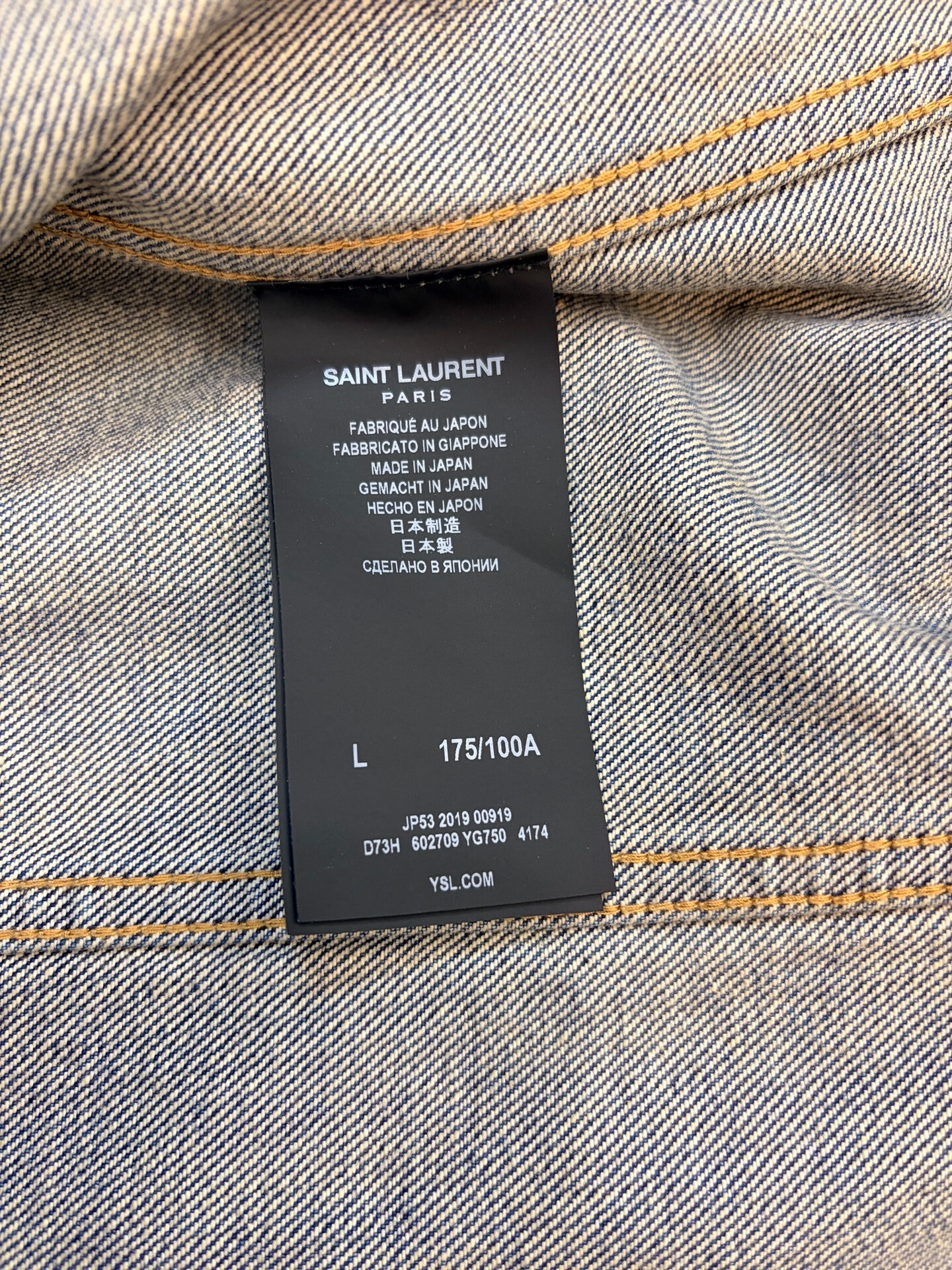 Saint Laurent Distressed Blue Denim Jacket — label