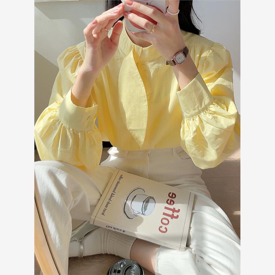 奶黄色长袖衬衫女2024年春季法式泡泡袖花瓣上衣设计感小众白衬衣