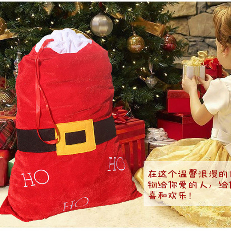 创可达热卖拉绳圣诞礼品袋丝绒布糖果袋平安夜扮圣诞老人道具