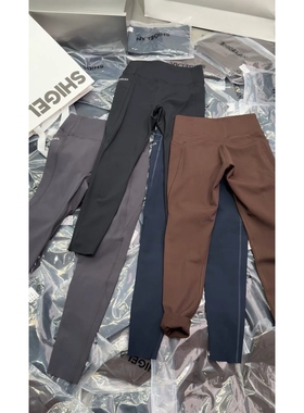 秒发诗歌兰16580运动时尚简约腹字母口袋薄绒瑜伽裤女2025秋冬潮