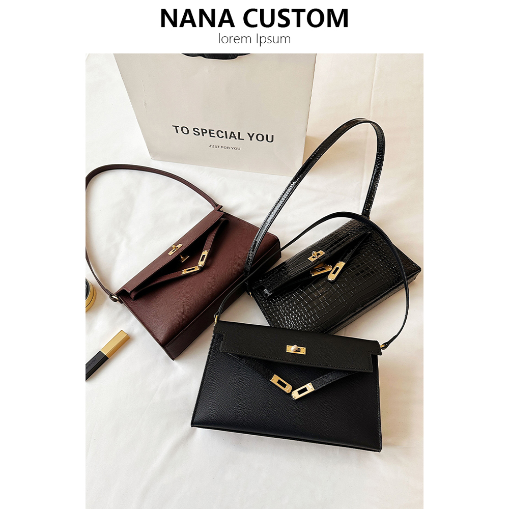 山羊纹真皮凯莉腋下包女