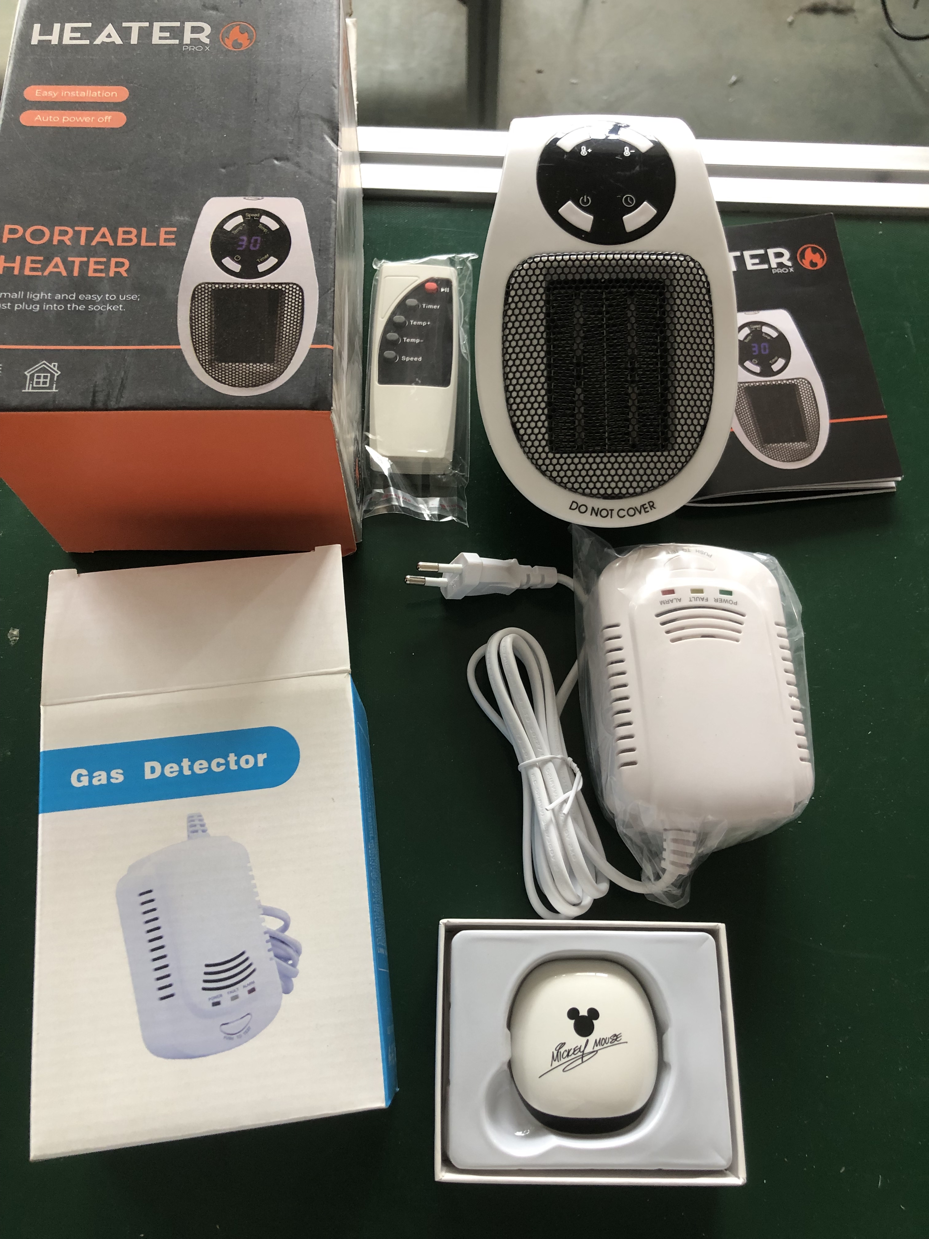 暖风机燃气报警器蓝牙耳机打包一起。   暖气机是110v。    0.8kg