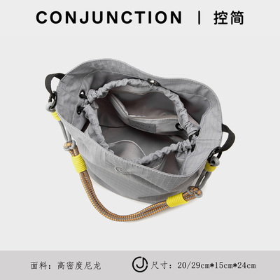 CONJUNCTION丨控简水桶包女2026新款尼龙大容量通勤单肩斜挎包