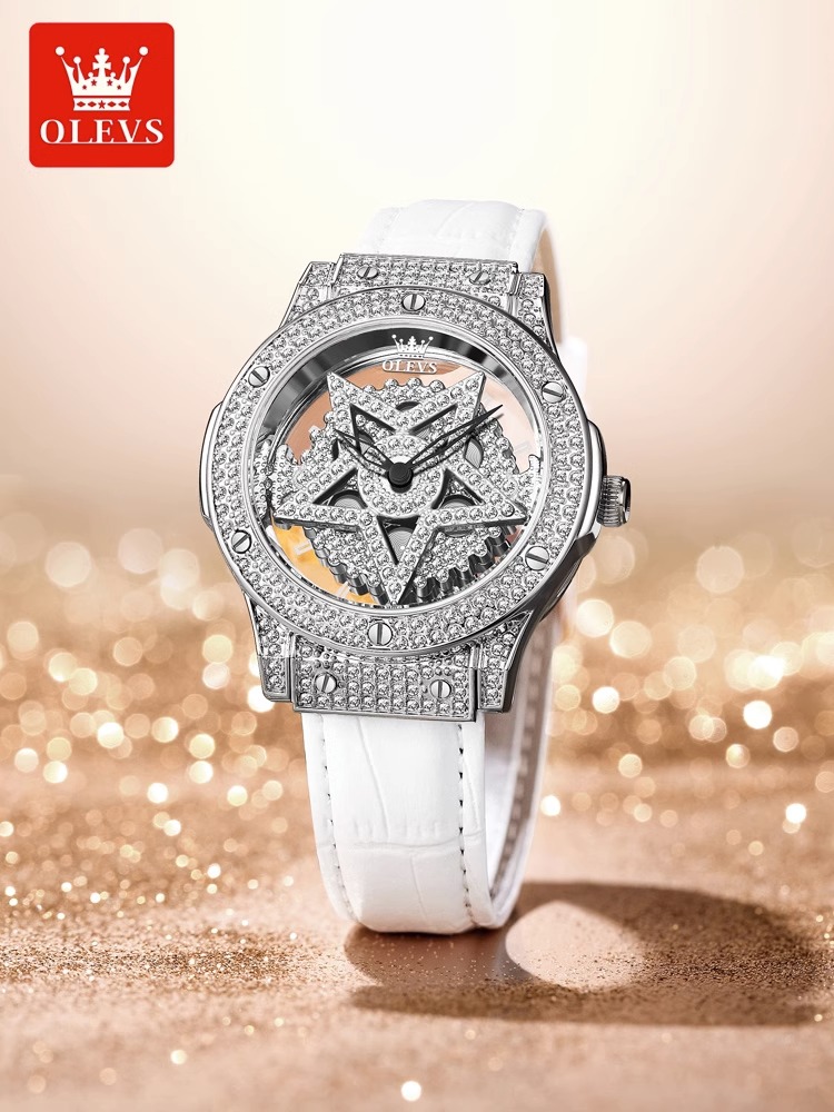 欧利时手表女简约气质镂空旋转表盘防水镶钻雪花五芒星石英表9938怎么看?