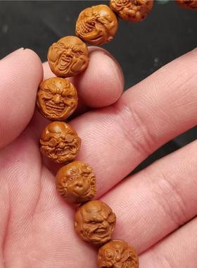 2026龙纹桃核雕刻(新款恶僧)尺寸1.2左右桃核雕刻手串橄榄核手链
