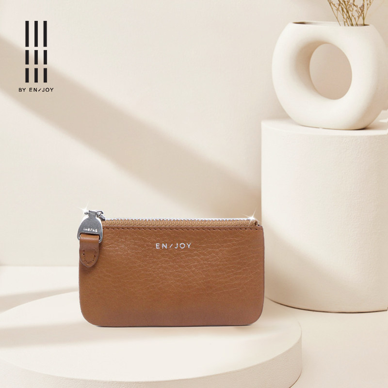 黑色质感白色高级牛皮拉链零钱包