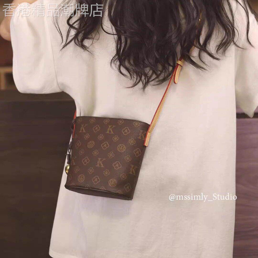 法国正品MK Jessie真皮水桶包包女式2026新款通勤百搭单肩斜挎包