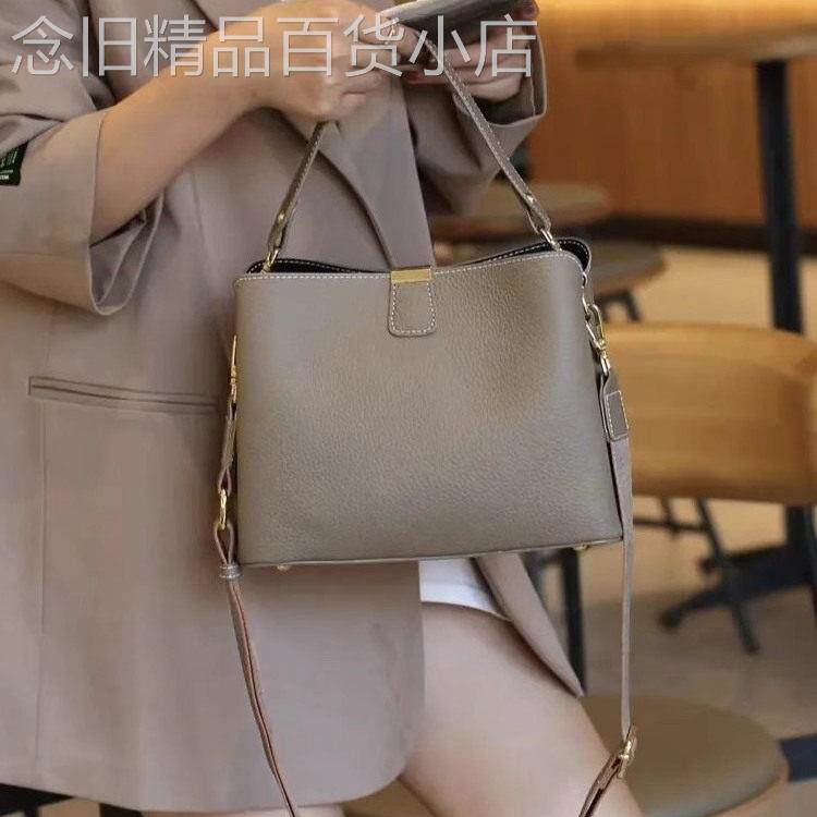 香港新款潮大容量水桶百搭通勤真皮单肩斜揹包时尚牛皮手提女包包