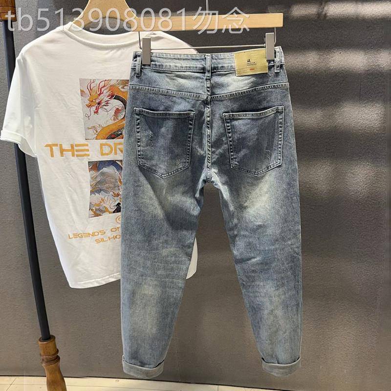 香港潮牌破洞刮烂补丁九分牛仔裤男新款修身小脚痞帅青年休闲裤子