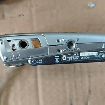 议价议价佳能IXUS950 is成色如图，包好没有电池
