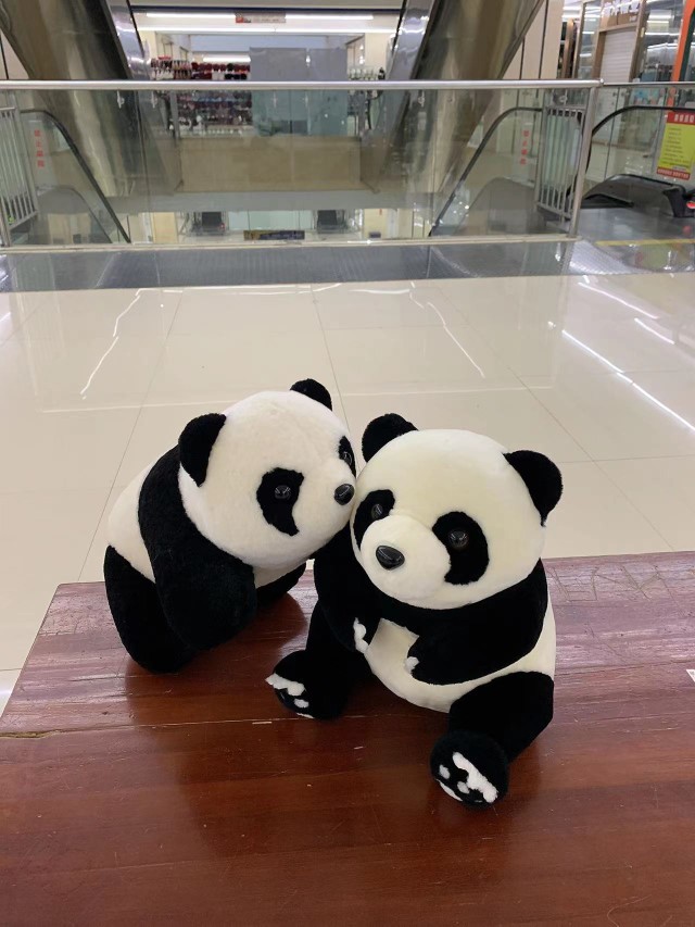 真毛进口羊毛熊猫花花玩偶公仔毛绒玩具和花网红萌兰大熊猫纪念品