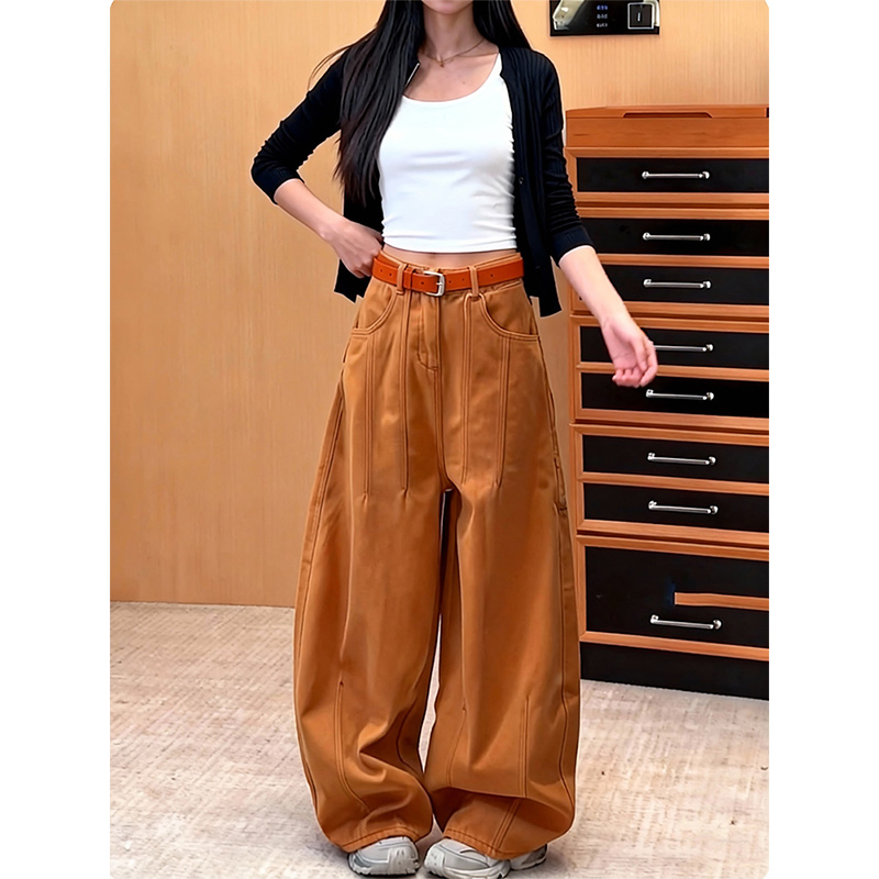 韩系橘色弯刀牛仔裤女2025冬季新