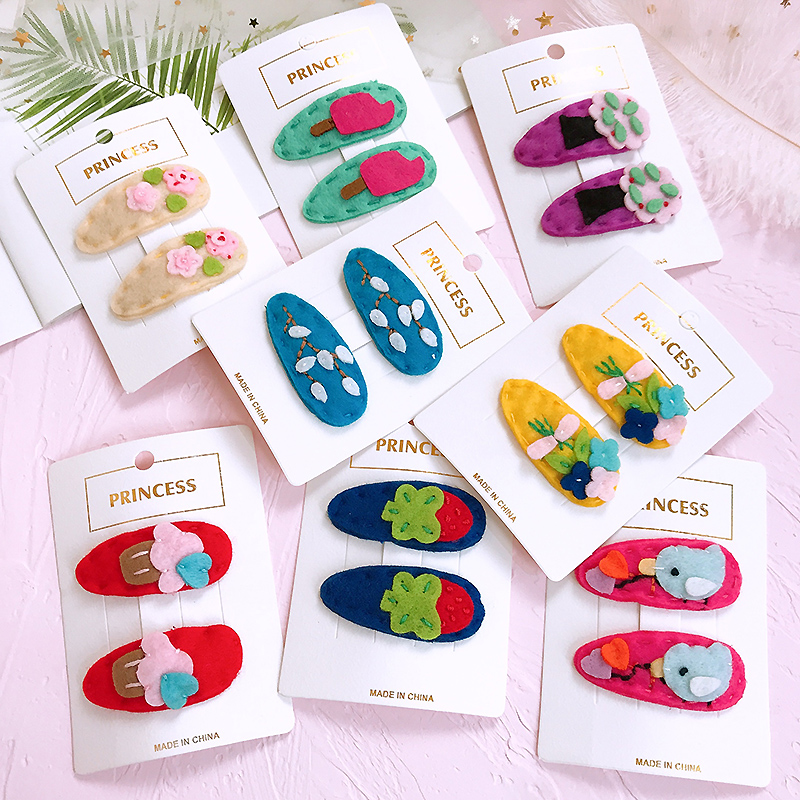 花朵卡通风毛呢水果边夹儿童发饰