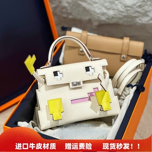 马赛克娃娃包机器人凯莉包真皮卡通笑脸包2026新款手提斜挎小包女
