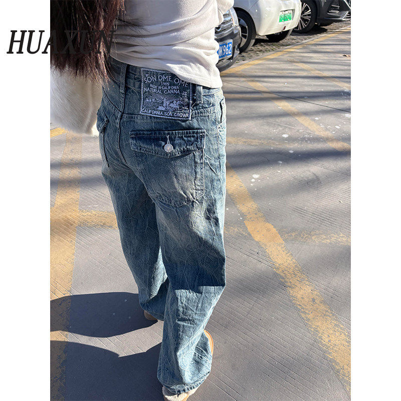 美式水洗蓝复古直筒牛仔裤女2026早春新款韩式绣标设计阔腿显瘦裤