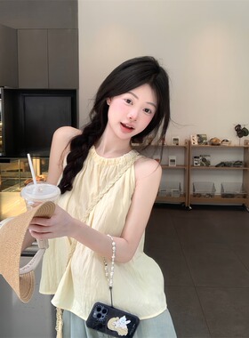 独特别致新款浅黄色挂脖无袖吊带背心女夏季宽松遮肉显瘦外穿上衣