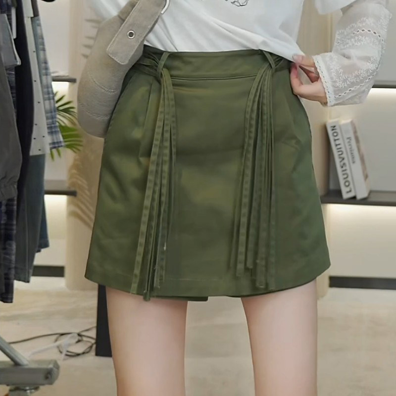 流苏绑带绿色半身裙裤女2026夏季时尚高级感设计A字休闲百搭短裙