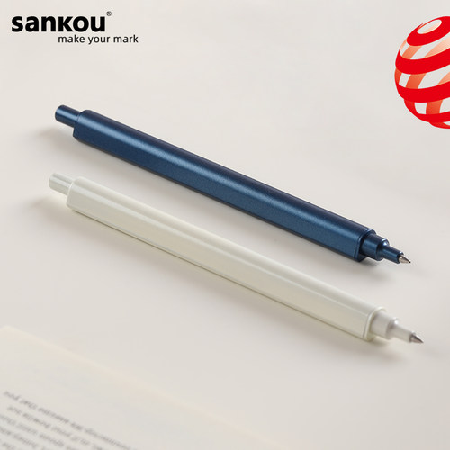 三口按动签字笔正姿笔握红点奖