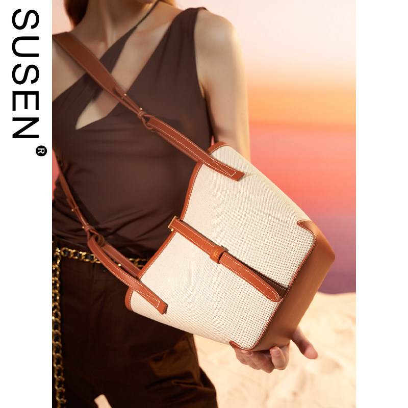 SUSEN简约兜兜包2021新款百搭单肩包女大容量水桶手提包