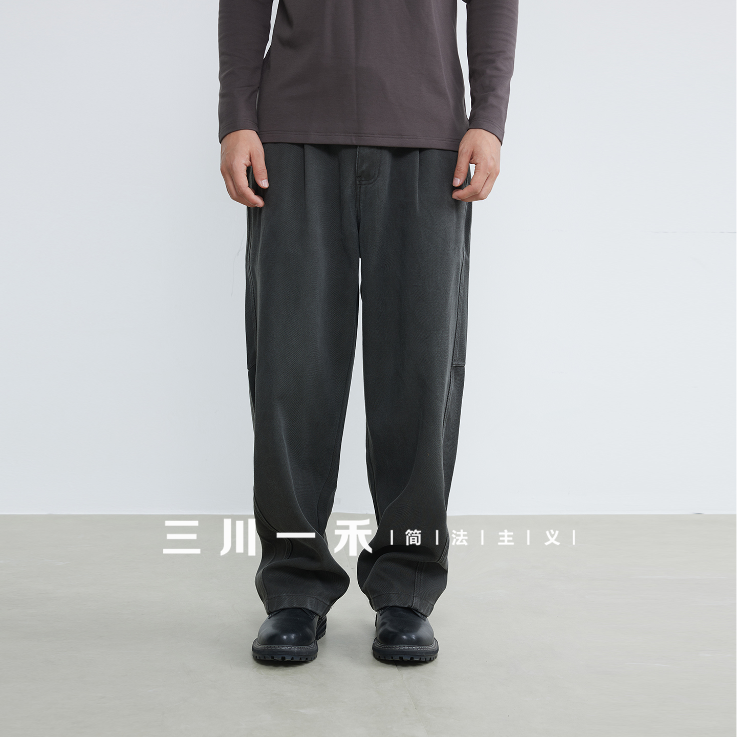 三川一禾男士时尚微弯刀休闲裤