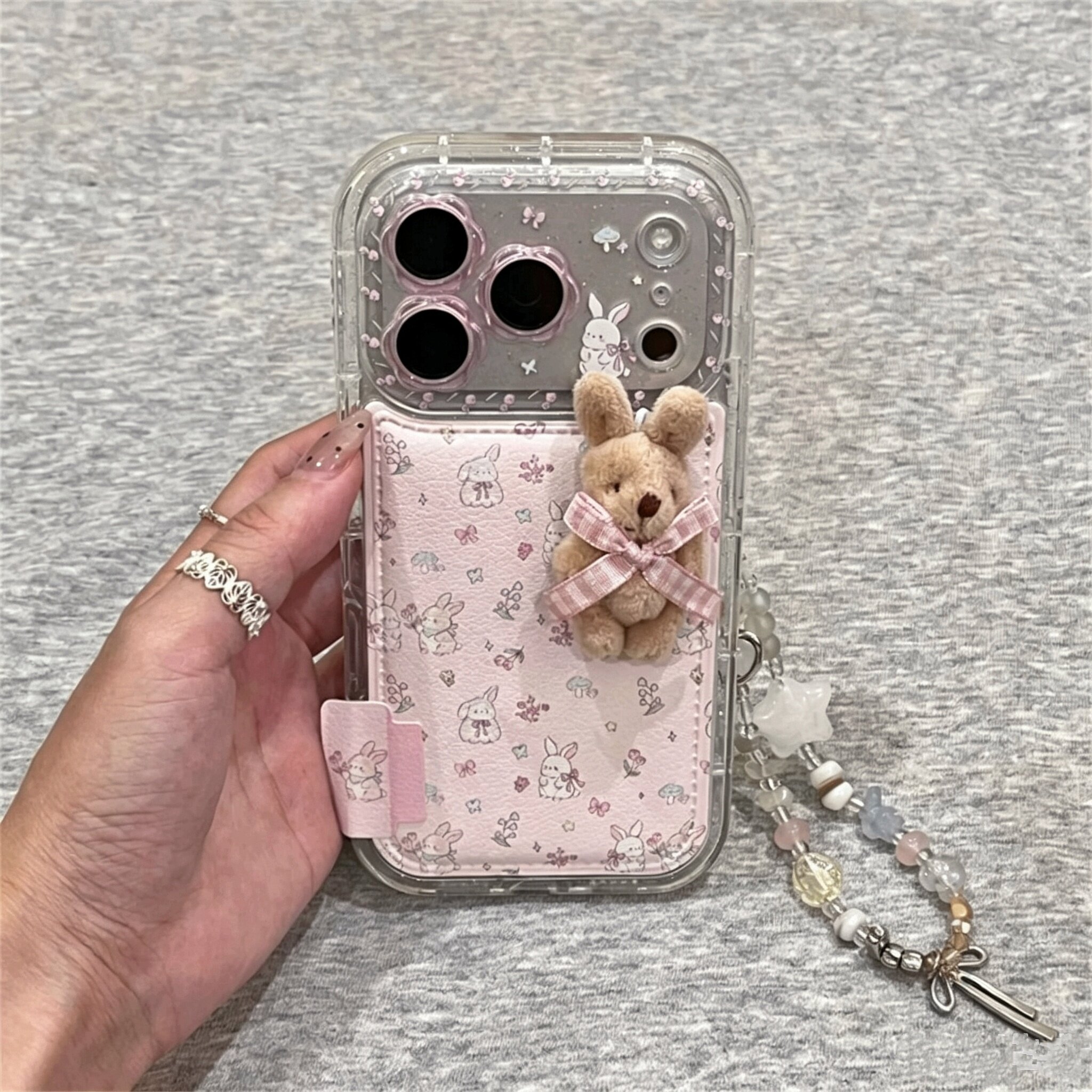 适用苹果系列iPhone17新款手机壳16promax14pro可爱包镜头皮革碎花兔子15promax13pro半包大孔防摔网红保护套